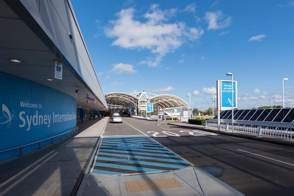 Sydney, Australia - July 05, 2017: Sydney International Airport, departure area in a sunny day.; Shutterstock ID 671921908; purchase_order: -; job: -; client: -; other: -